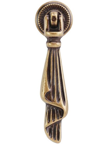 Swag Drop Pull with Ridged Rosette - .79 inch x 2.87 inch in Antique Brass Dark.